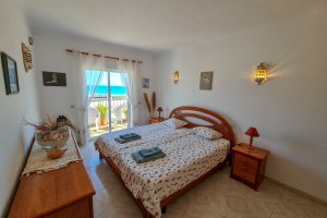 apartment bellevue meia praia master bedroom